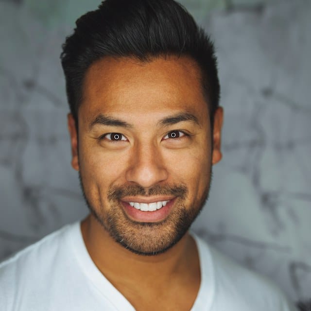 Temporary sample portrait of a smiling man in a white shirt; stock model, not a Dillon’s employee.